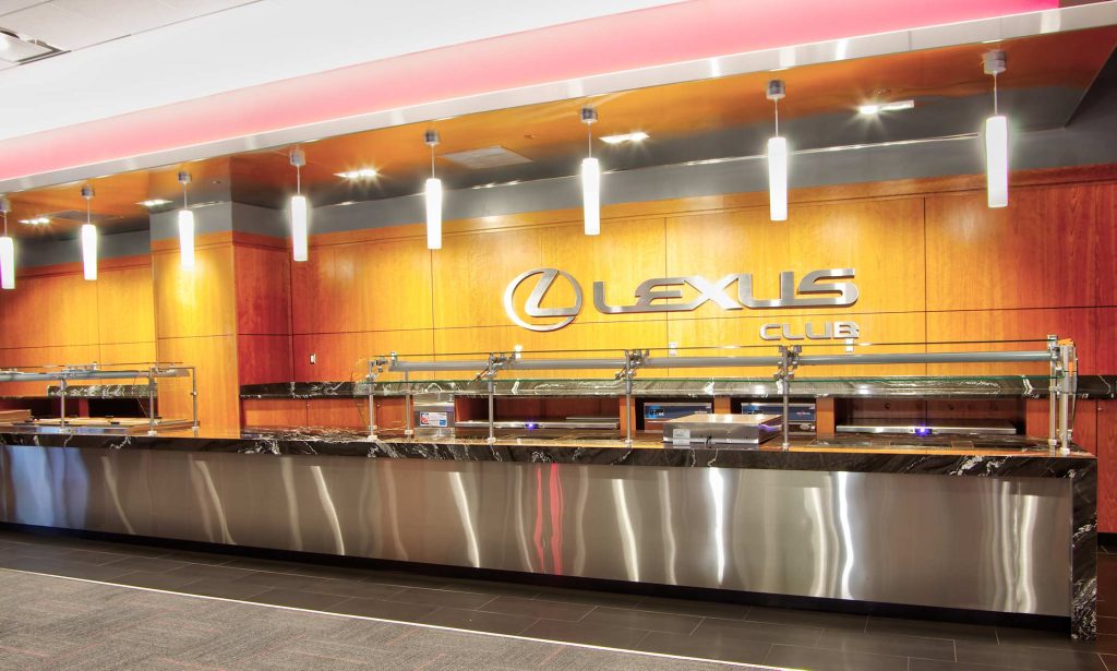 Black marble buffet counter with pendant lights and logo