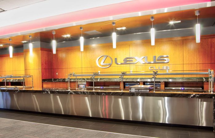 Black marble buffet counter with pendant lights and logo